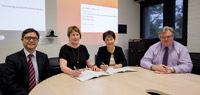 Dr. Ella Chan (2nd from right), Director of the School, and Dr. Julie Jackson (2nd from left), Pro Vice-Chancellor (Educational Partnerships and Quality) of La Trobe University, Australia, sign the Addendum of the Bachelor of Nursing Programme